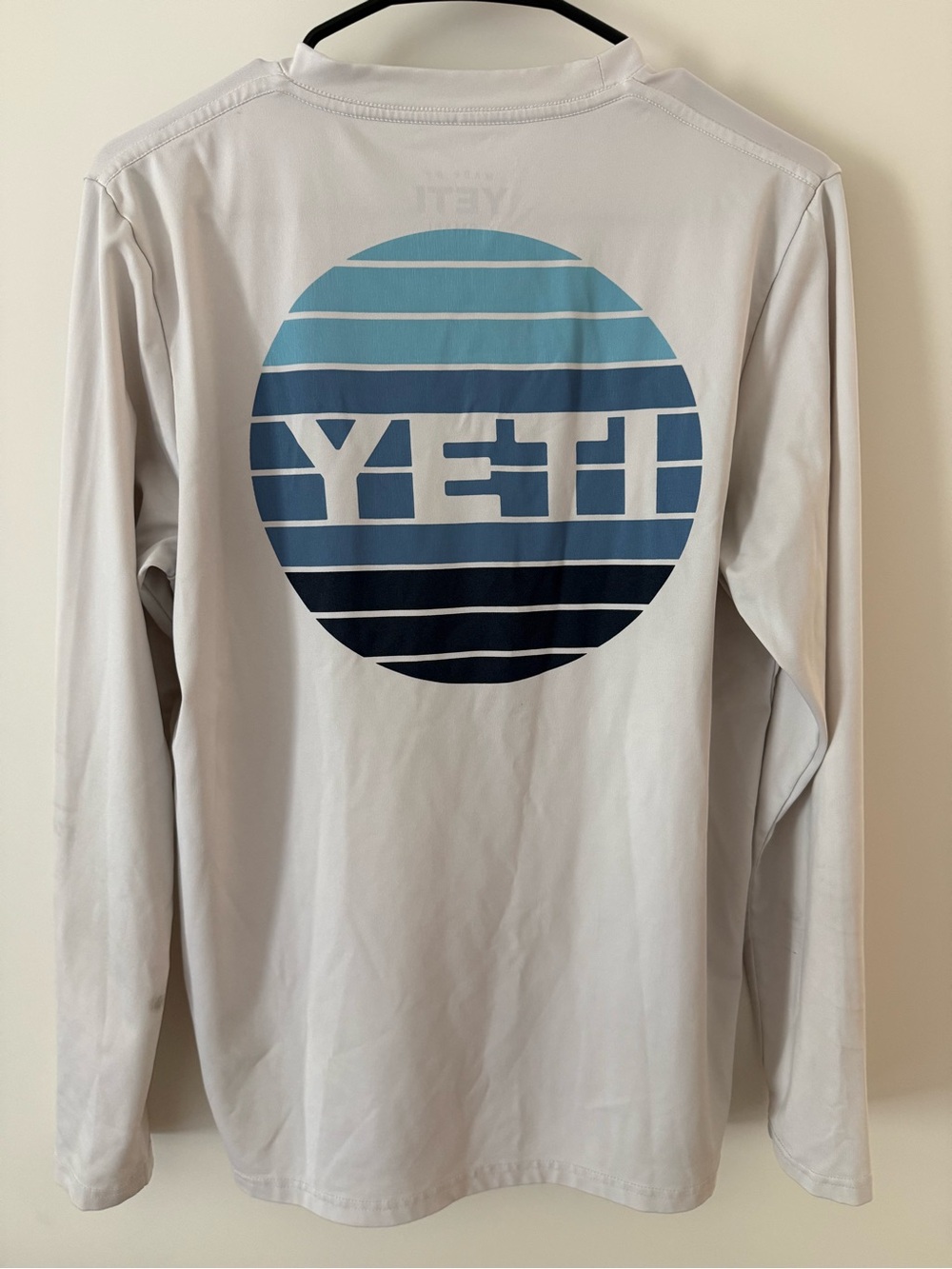 Yeti Men's Long-Sleeve Performance Shirt in White with Gradient Blue Logo